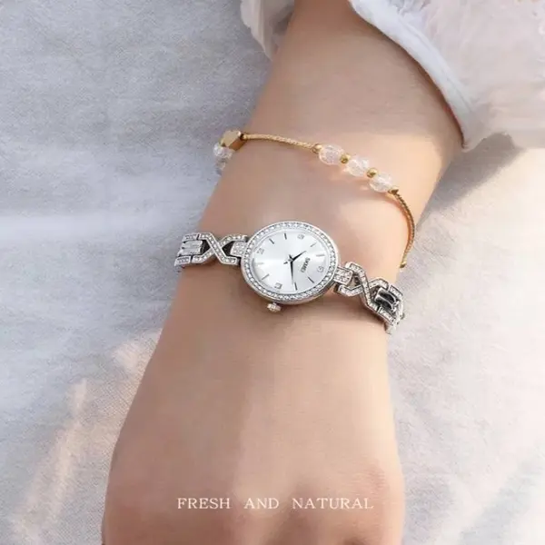 SKMEI 1738 Iced Elegant Round Dial Diamond Rhinestone Bracelet Design Women Watch – Dial Color: Silver, Strap Color: Silver – View 3